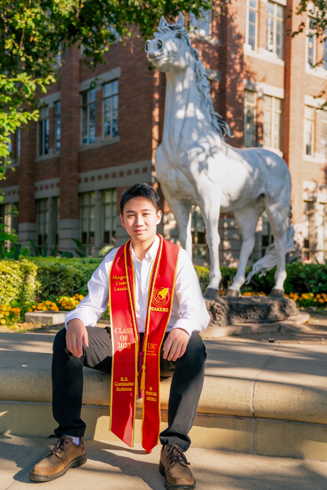 Wearing the sash at USC Traveler statue